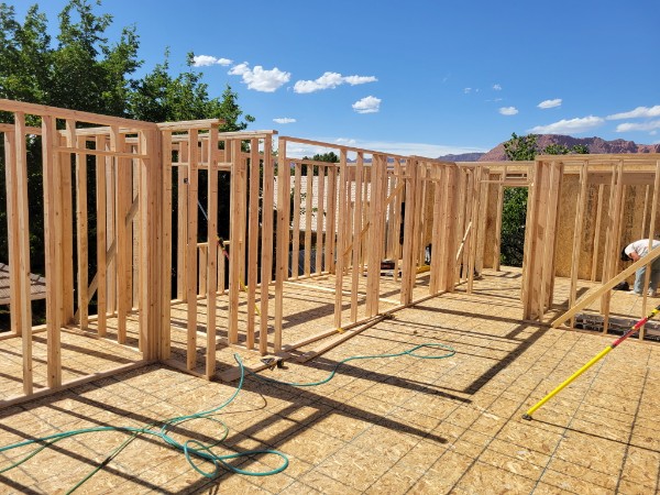Wide upper framing with brick-neighborhood and red-ridge context.
